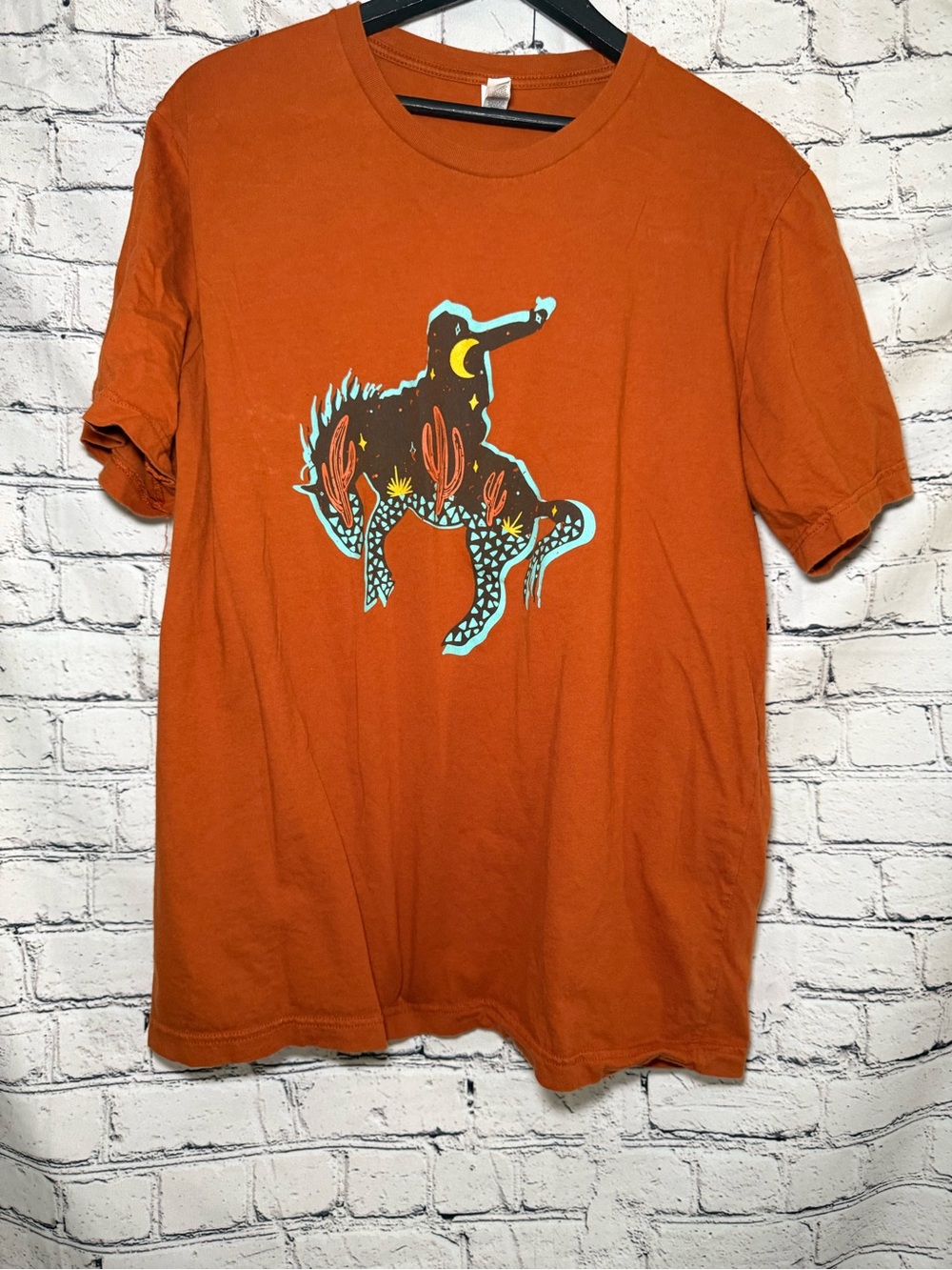 Orange rodeo graphic Tshirt. Size XL
